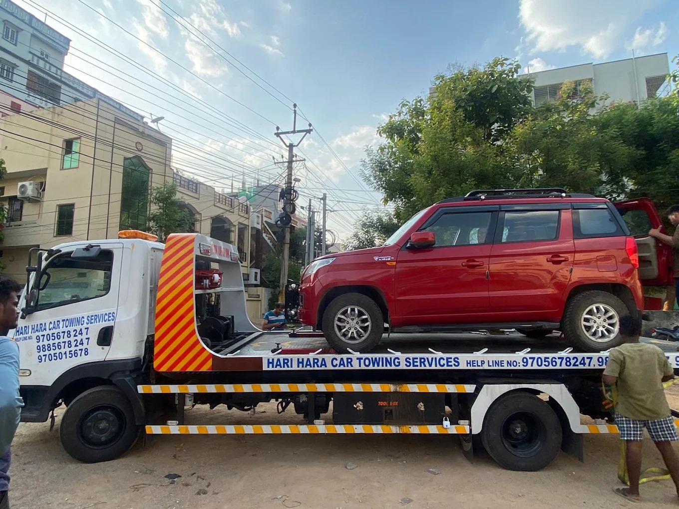 Car being towed in Choutuppal